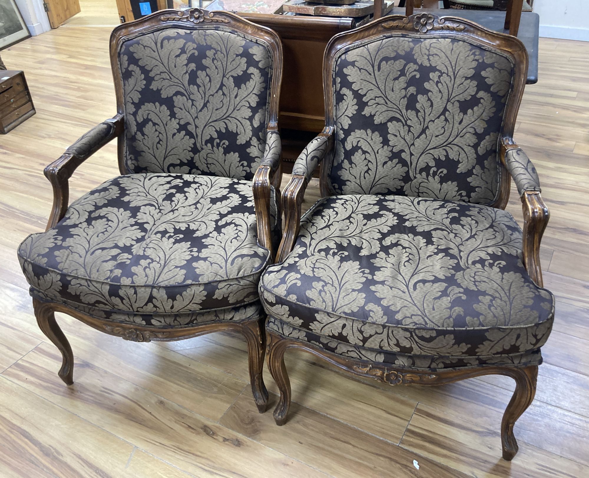 A pair of Louis XVI design beech open armchairs from The Grand Hotel, Brighton, width 65cm, depth 60cm, height 92cm